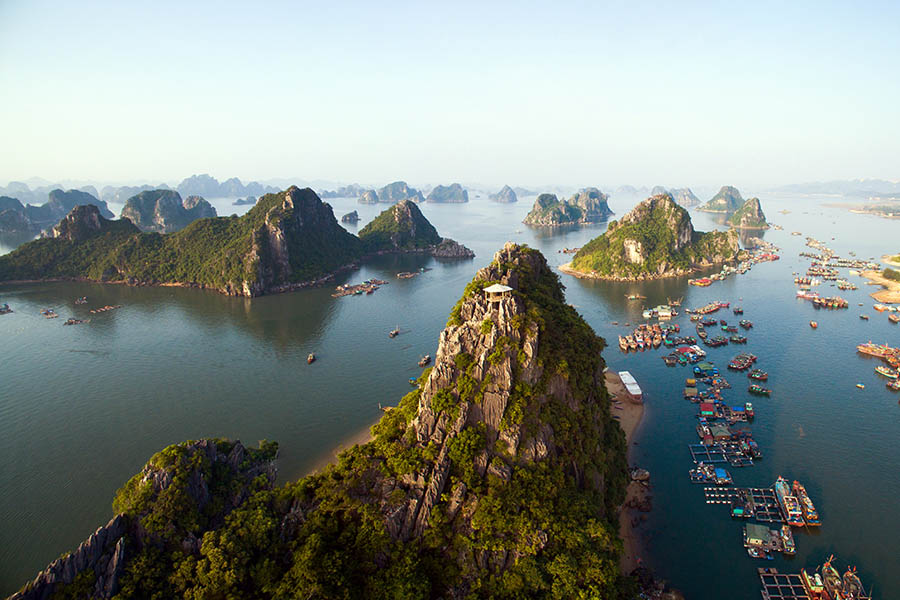 Sit back as boat you cruise through the magnificent formations of Halong Bay